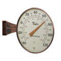 8.5 inch weatherproof thermometer with a round glass dial and brown frame.