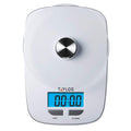 Glass platform digital kitchen scale close-up with a circular metal knob and blue digital display.