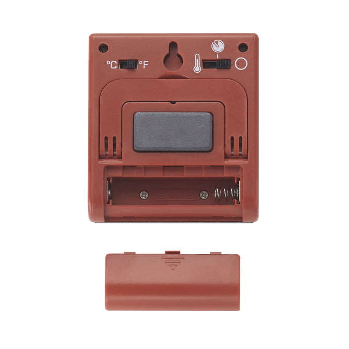 Back view of brown wired probe thermometer with battery compartment open and visible spring contacts